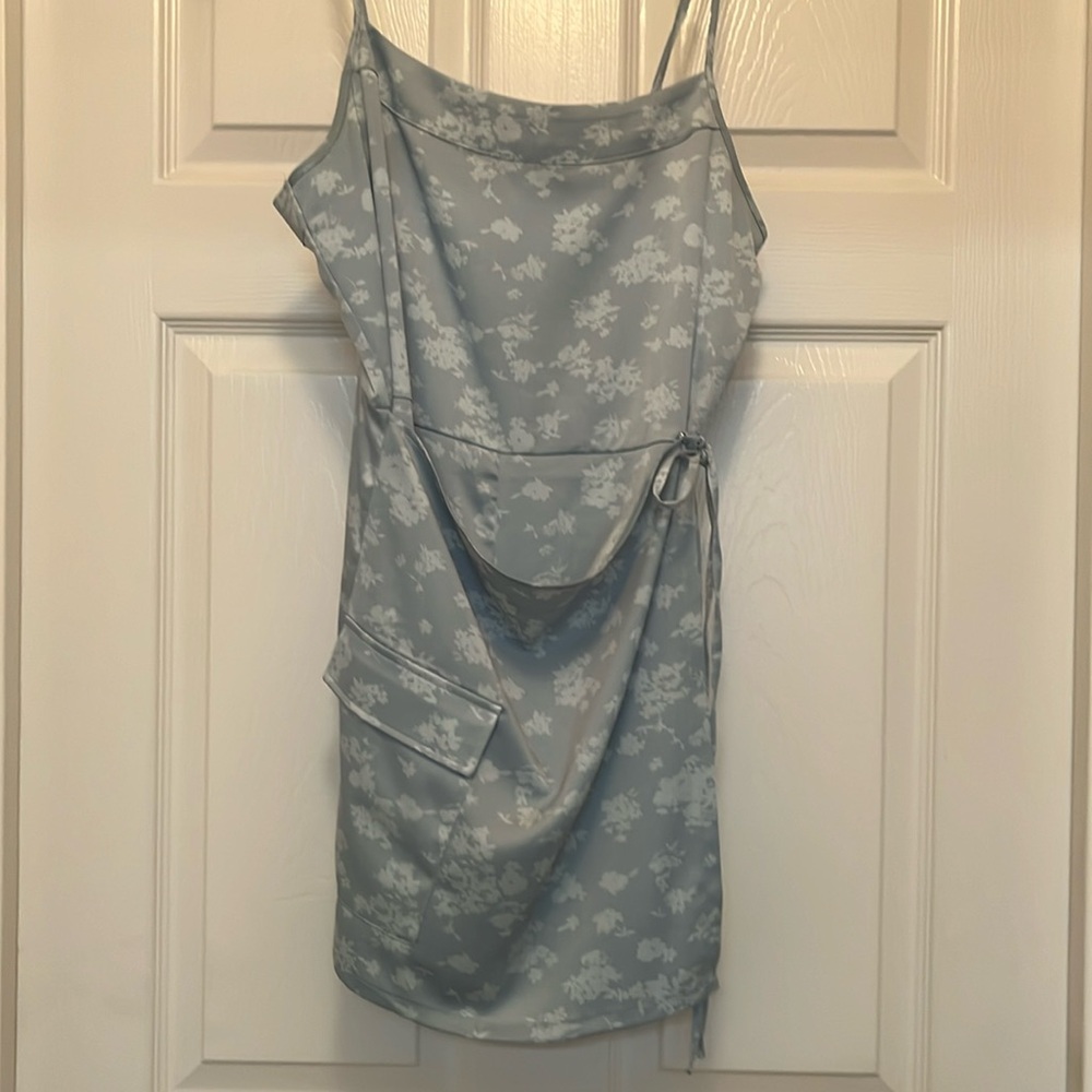 Urban Outfitters mini romper with skirt baby blue size medium.